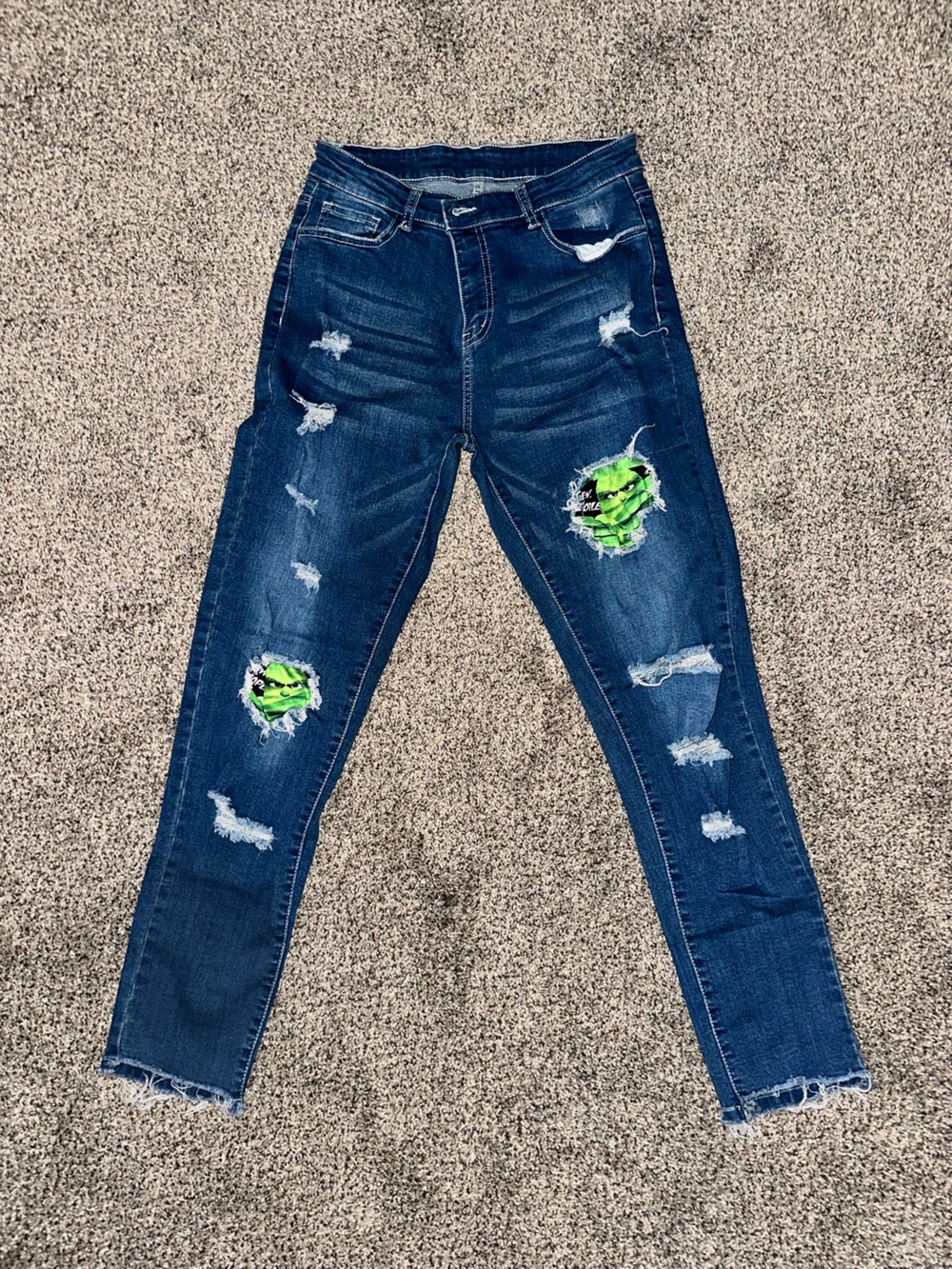 Dark Wash Distressed Jeans with Grinch Patch Detail